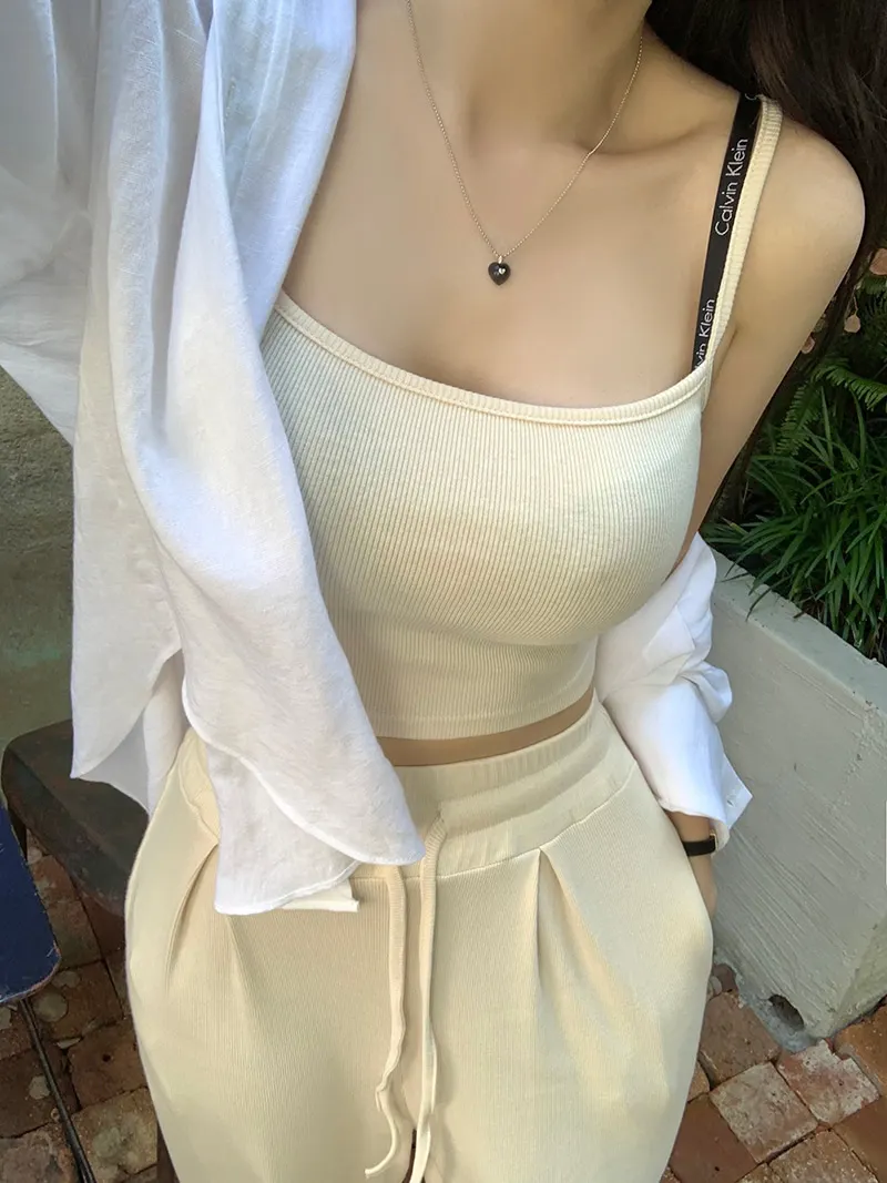 Women's Slim Fit Tank Top And Wide Leg Pants Set Fashionable Casual Cotton Outfit Straight Cut Trousers Trendy Ensemble
Women's Slim Fit Tank Top And Wide Leg Pants Set Fashionable Casual Cotton Outfit Straight Cut Trousers Trendy Ensemble