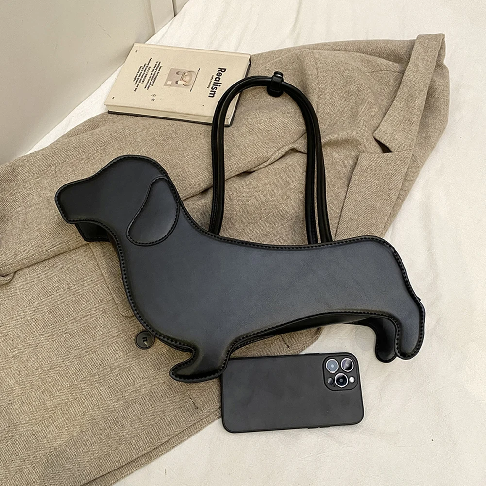 Сумка на плечо в форме собаки с рисунком, кошелек из искусственной кожи, уникальная новинка, клатч, милая вечерняя сумка для женщин и девочек
Сумка на плечо в форме собаки с рисунком, кошелек из искусственной кожи, уникальная новинка, клатч, милая вечерняя сумка для женщин и девочек