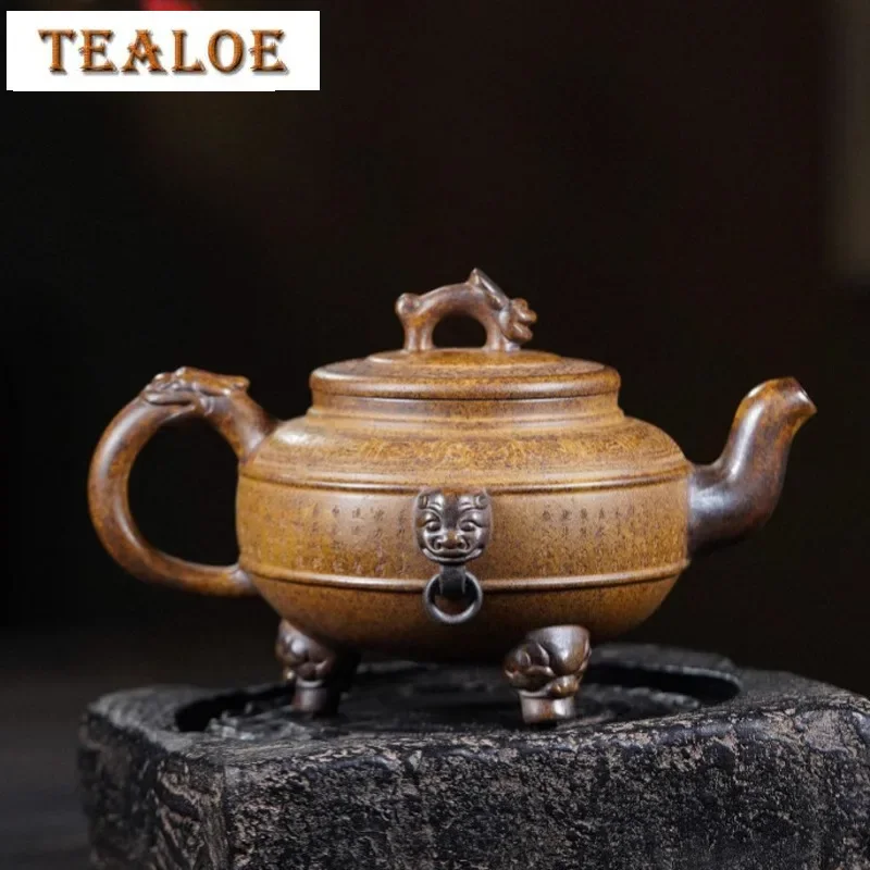 420ml Yixing Purple Clay Teapots Handmade Tripodia Tripod Pot Raw Ore Dragon Kiln Wood Burning Mud Tea Maker Kettle Zisha Teaset
420ml Yixing Purple Clay Teapots Handmade Tripodia Tripod Pot Raw Ore Dragon Kiln Wood Burning Mud Tea Maker Kettle Zisha Teaset