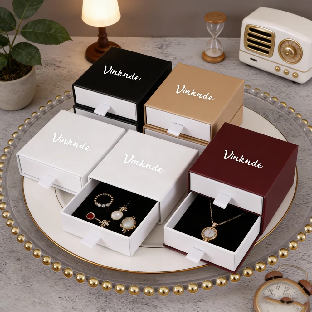 24/50/100Pcs Jewelry Display Boxes with White Sponge Rings Earrings Organizer Box Customizable Logo Gift Case for Jewellry Bulk
24/50/100Pcs Jewelry Display Boxes with White Sponge Rings Earrings Organizer Box Customizable Logo Gift Case for Jewellry Bulk