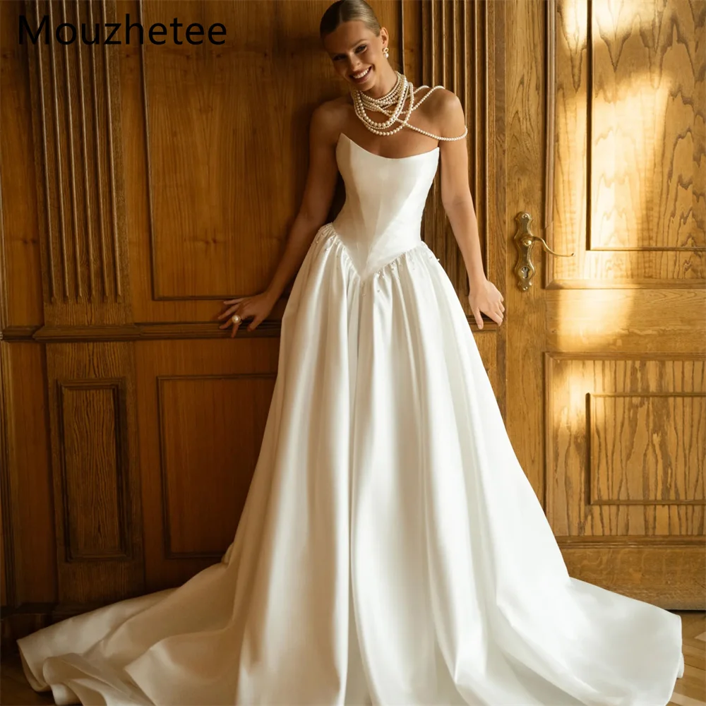 Booma A-Line Simple Strapless Pearls Satin Wedding Dresses Sleeveless Satin Elegant Brides Gown Custom Made 2026
Booma A-Line Simple Strapless Pearls Satin Wedding Dresses Sleeveless Satin Elegant Brides Gown Custom Made 2026