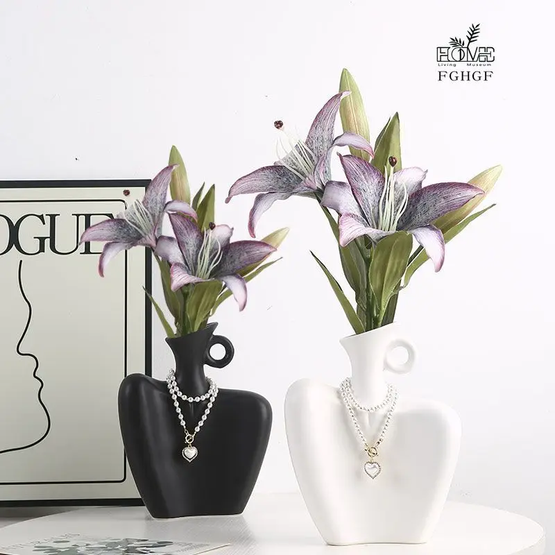 Nordic light luxury ceramic portrait entrance dining room living room decorative vase set creative niche
Nordic light luxury ceramic portrait entrance dining room living room decorative vase set creative niche