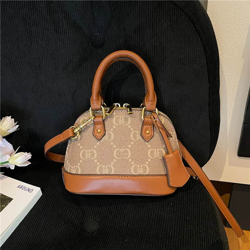 2025 Spring Summer French Retro Shell Shoulder Bag Womens Classic Stylish Crossbody Purse Minimalist Designer Handbag
2025 Spring Summer French Retro Shell Shoulder Bag Womens Classic Stylish Crossbody Purse Minimalist Designer Handbag