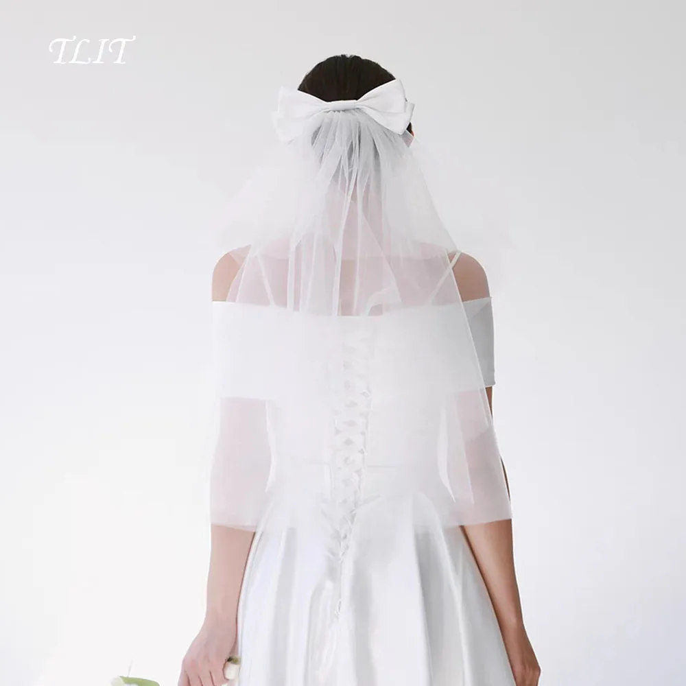 TLIT Элегантная двухслойная фата для невесты с коротким локтем, фата из тюля с расческой и обрезанным краем, индивидуальный атласный бант для женщин
TLIT Элегантная двухслойная фата для невесты с коротким локтем, фата из тюля с расческой и обрезанным краем, индивидуальный атласный бант для женщин