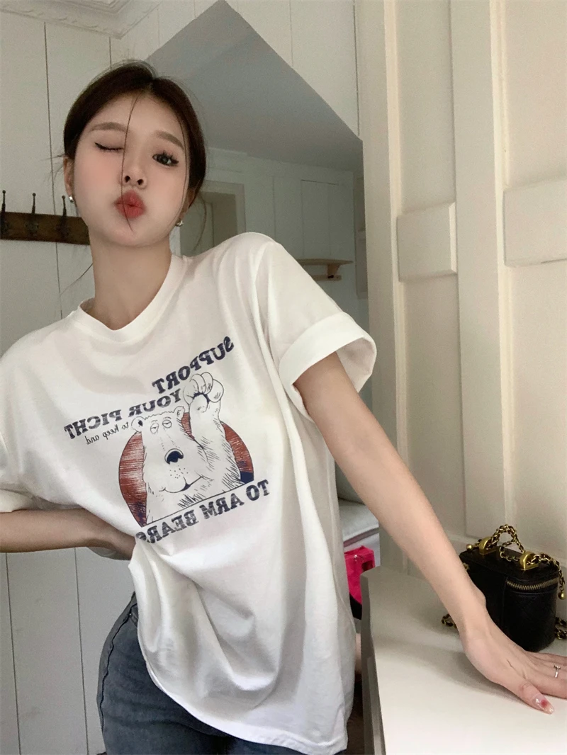 Cartoon Print Summer T-Shirts Women O-Neck Short Sleeve Vintage Top Tess Loose Casual Kawaii White Shirts Designer Streetwear
Cartoon Print Summer T-Shirts Women O-Neck Short Sleeve Vintage Top Tess Loose Casual Kawaii White Shirts Designer Streetwear