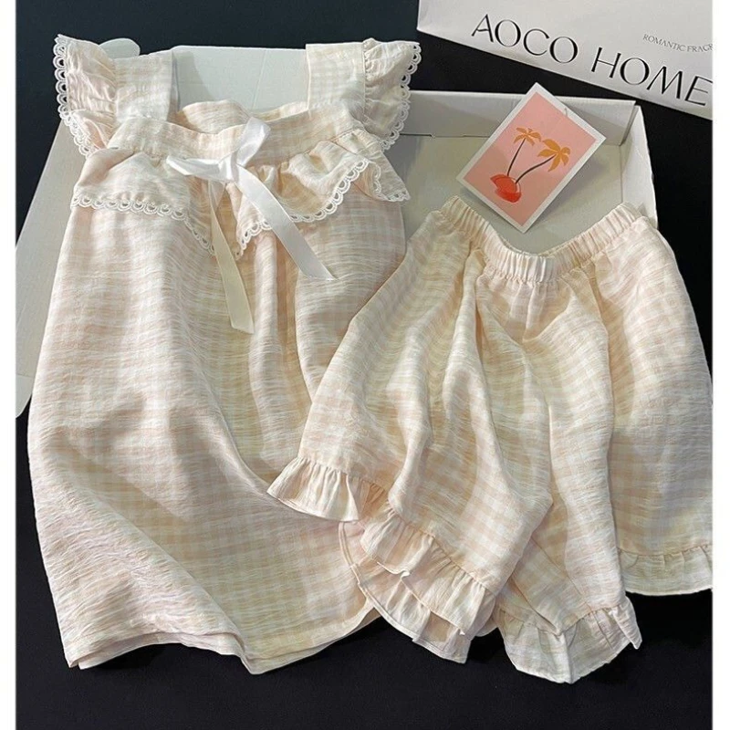 2025 Kawaii Sleeveless Pajamas with Chest Pads Summer Women's Suspenders Flying Sleeve Tops Cute Sweet Plaid Girl Loungewear Set
2025 Kawaii Sleeveless Pajamas with Chest Pads Summer Women's Suspenders Flying Sleeve Tops Cute Sweet Plaid Girl Loungewear Set