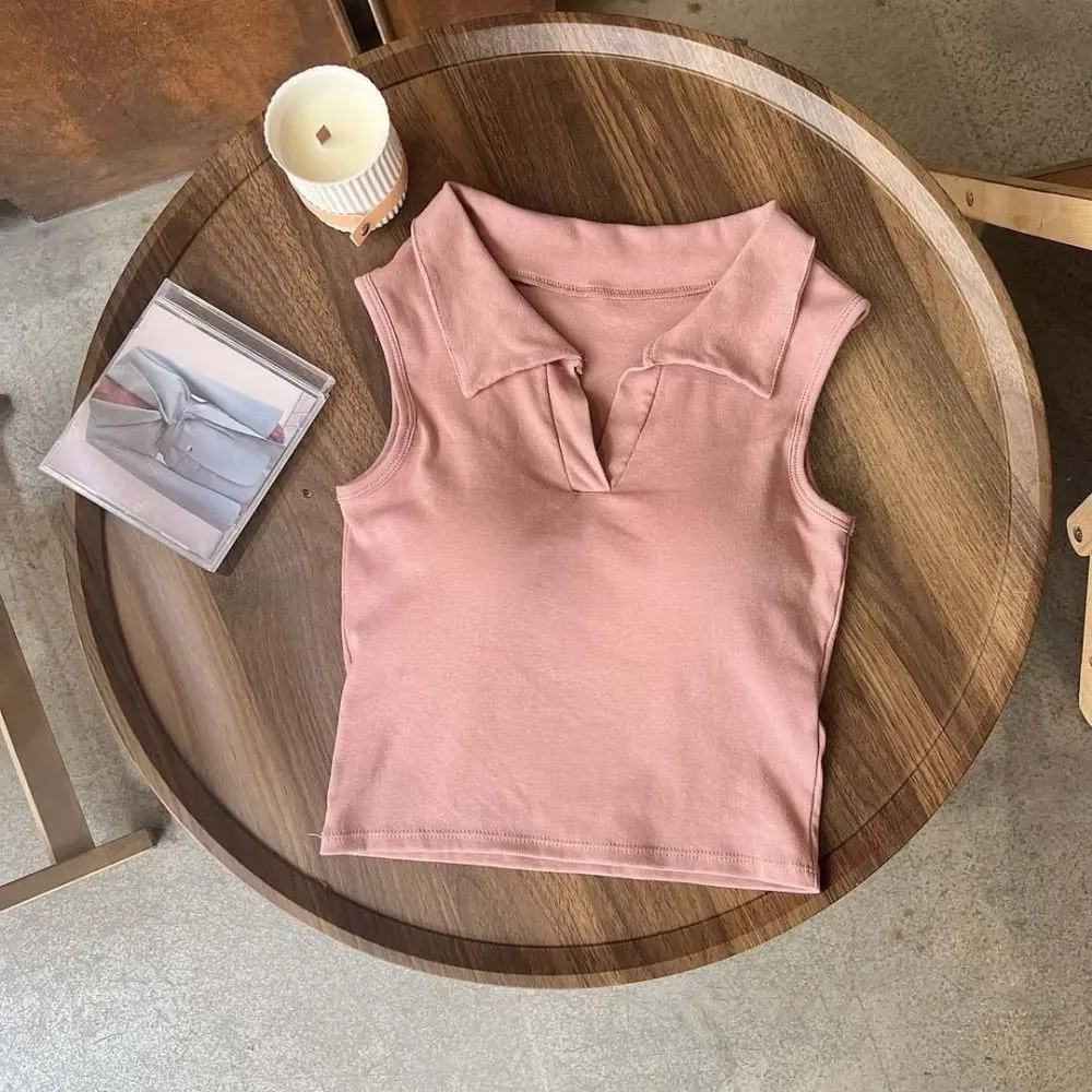 Leisure Solid Color Polo Neck Vest Cotton with Chest Pads Korean Y2K Crop Tops Sleeveless V-neck Slim Short T-shirt Party
Leisure Solid Color Polo Neck Vest Cotton with Chest Pads Korean Y2K Crop Tops Sleeveless V-neck Slim Short T-shirt Party
