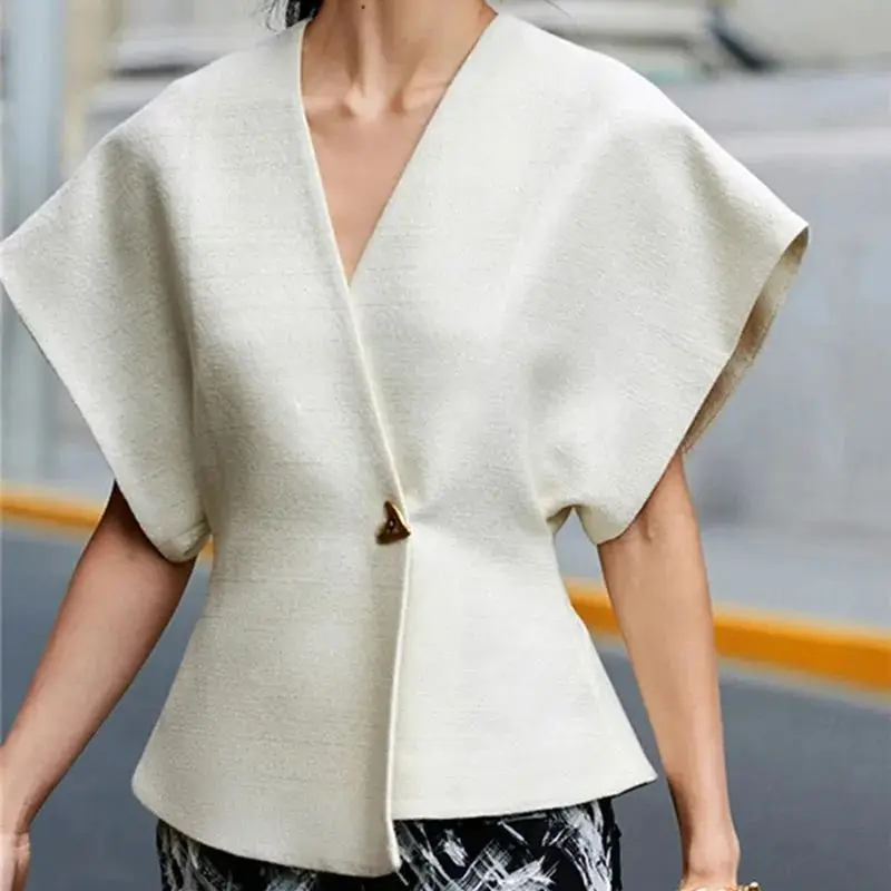 Wedifor Elegant Irregular Metal Buttons Women Shirt Short Sleeve V Neck Casual Vest Tops Fashion Streetwear Chic Female Clothes
Wedifor Elegant Irregular Metal Buttons Women Shirt Short Sleeve V Neck Casual Vest Tops Fashion Streetwear Chic Female Clothes