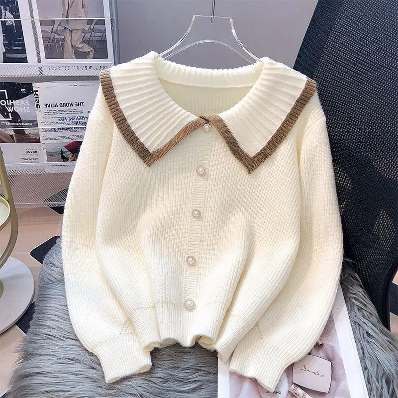Autumn and Winter Sweater Sweet Doll Neck Sweater Cardigan Women's 2025 Color Blocked New Knitted Sweater Coat
Autumn and Winter Sweater Sweet Doll Neck Sweater Cardigan Women's 2025 Color Blocked New Knitted Sweater Coat