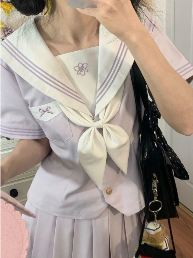 Sweet Sailor Collar Bow Short Sleeve Jk Top for Women+ Y2k High Waist Pleated A-line Skirts 2025 Summer New Two Piece Sets
Sweet Sailor Collar Bow Short Sleeve Jk Top for Women+ Y2k High Waist Pleated A-line Skirts 2025 Summer New Two Piece Sets
