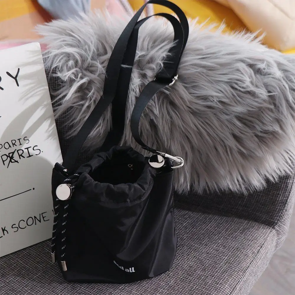 Casual Korean Style Black Drawstring Bucket Bag Nylon Luxury INS Shoulder Bag Portable Fashion Crossbody Bags Women
Casual Korean Style Black Drawstring Bucket Bag Nylon Luxury INS Shoulder Bag Portable Fashion Crossbody Bags Women