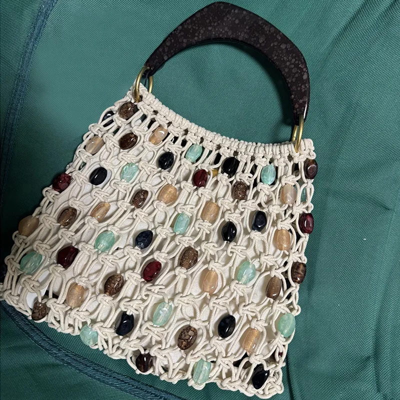 Hand-woven Beaded Tote Bag With Wooden Handle Boho Style Knitted Handbag Large Capacity Hollow Out Woven Bag For Summer Beach
Hand-woven Beaded Tote Bag With Wooden Handle Boho Style Knitted Handbag Large Capacity Hollow Out Woven Bag For Summer Beach