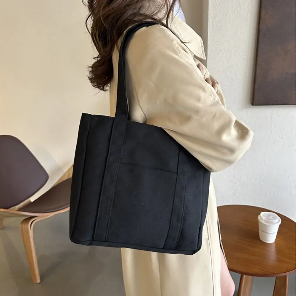 Solid Color Large-capacity Canvas Bag Portable Comfortable Handle Hand-held Tote Bag Blank Canvas Zipper Closure
Solid Color Large-capacity Canvas Bag Portable Comfortable Handle Hand-held Tote Bag Blank Canvas Zipper Closure