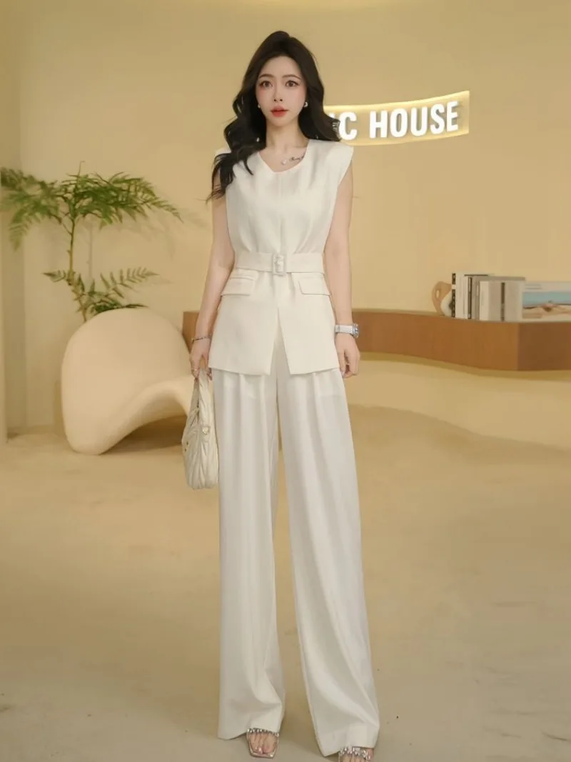 Новый элегантный элитный летний женский костюм, модная рубашка без рукавов с круглым вырезом, топ + широкие брюки, однотонный комплект из двух предметов, наряд
Новый элегантный элитный летний женский костюм, модная рубашка без рукавов с круглым вырезом, топ + широкие брюки, однотонный комплект из двух предметов, наряд