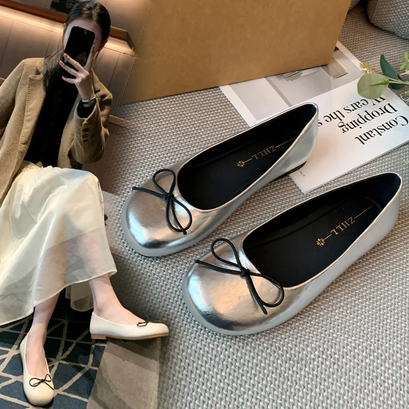 Silver Metallic Ballet Flats For Women With Black Bow Detail And Round Toe Comfortable Casual Daily Walking And Office Wear Shoe
Silver Metallic Ballet Flats For Women With Black Bow Detail And Round Toe Comfortable Casual Daily Walking And Office Wear Shoe