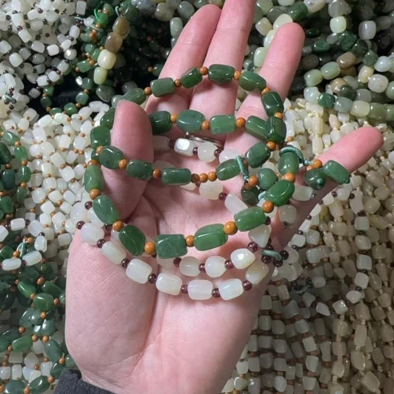 Natural Hetian irregular-shaped square bracelet, fine texture of green and white jade
Natural Hetian irregular-shaped square bracelet, fine texture of green and white jade