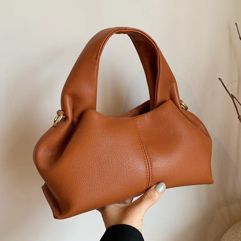 Ladies Simple Dumpling Shape Shoulder Handbag New French Luxury Brand Genuine Leather Cloud Bag Fashion Female New Handbags
Ladies Simple Dumpling Shape Shoulder Handbag New French Luxury Brand Genuine Leather Cloud Bag Fashion Female New Handbags