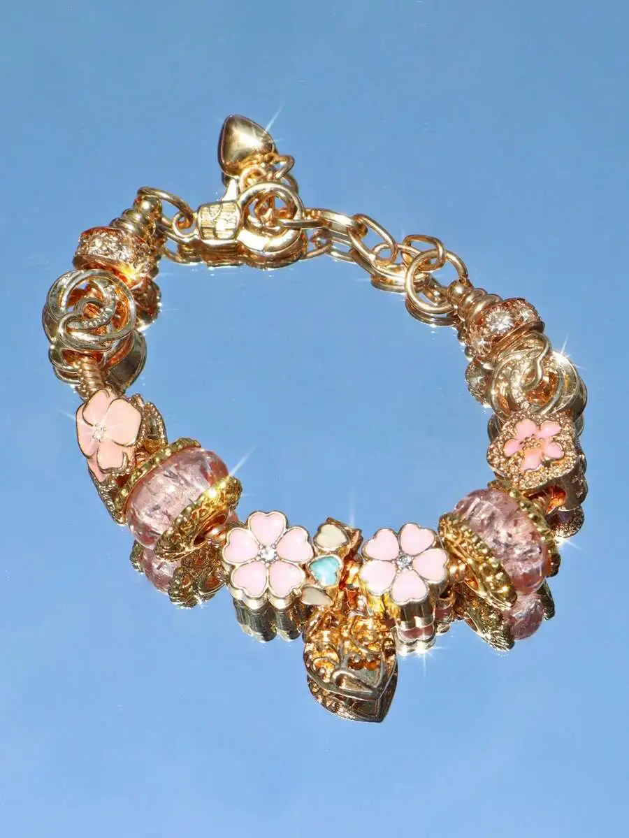 Pink Enamel Sakura Flower Charm Bracelet With Gold-Tone Chain, Y2K Aesthetic Floral Jewelry For Festive Occasions
Pink Enamel Sakura Flower Charm Bracelet With Gold-Tone Chain, Y2K Aesthetic Floral Jewelry For Festive Occasions