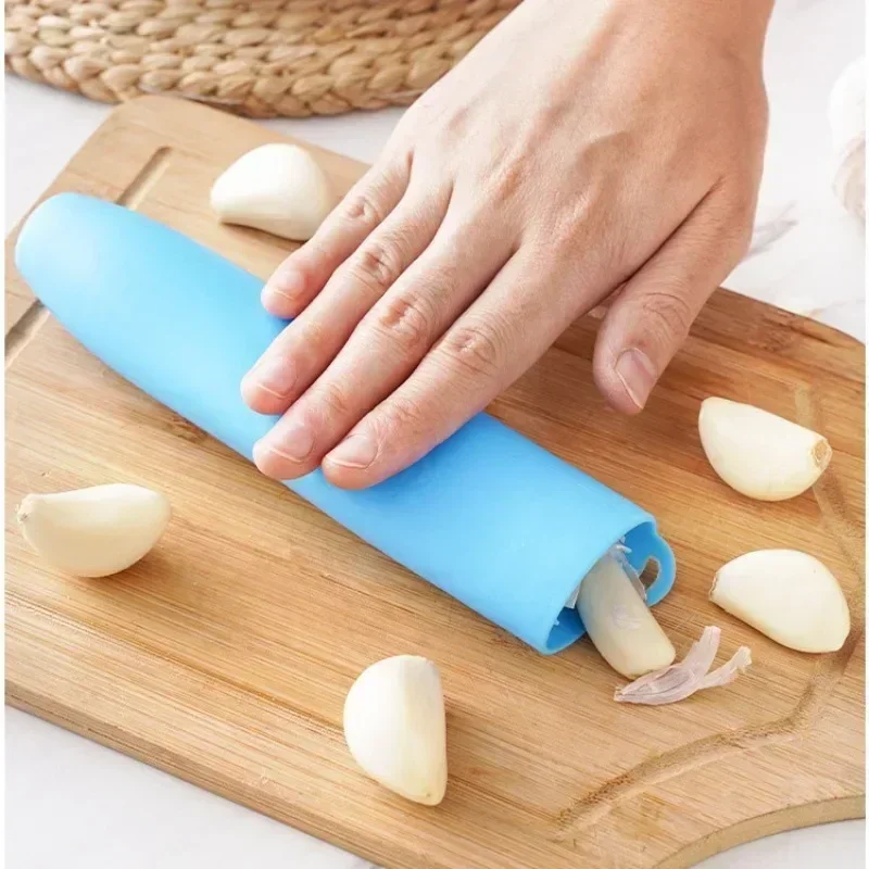 1pc Silicone Garlic Peeler Creative Household Stripper Tube Garlic Peeling Tools Kitchen Gadgets Random Color
1pc Silicone Garlic Peeler Creative Household Stripper Tube Garlic Peeling Tools Kitchen Gadgets Random Color