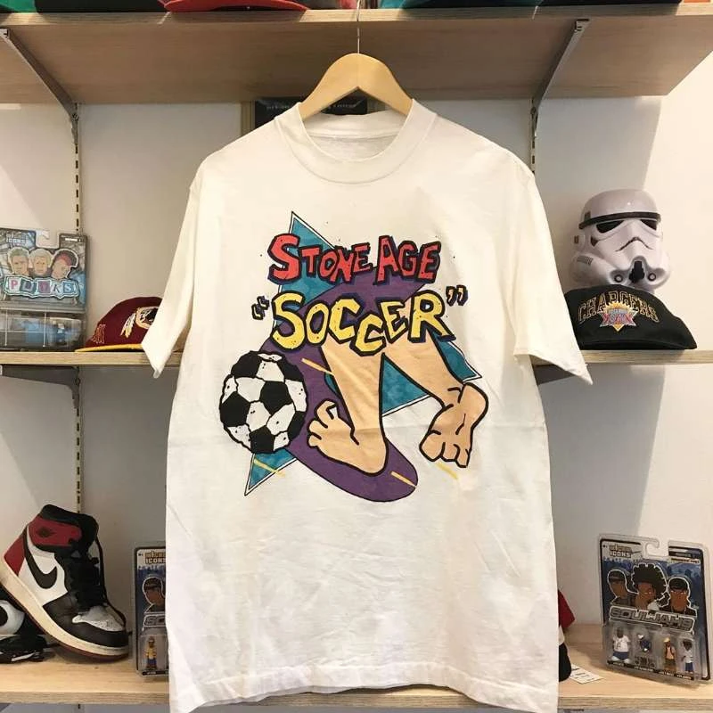 Stone Age Soccer Around The Niche Fun с мультяшным принтом и короткими рукавами, летние роскошные брендовые хлопковые мужские и женские футболки
Stone Age Soccer Around The Niche Fun с мультяшным принтом и короткими рукавами, летние роскошные брендовые хлопковые мужские и женские футболки