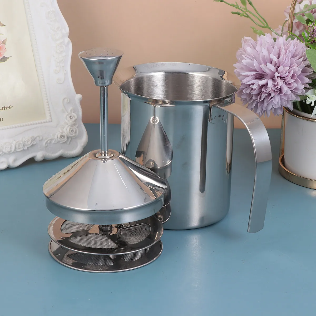 Stainless Steel Manual Milk Frother with Double Mesh Filter for Thick Froth in Seconds Coffee Utensil 800Cc Milk
Stainless Steel Manual Milk Frother with Double Mesh Filter for Thick Froth in Seconds Coffee Utensil 800Cc Milk