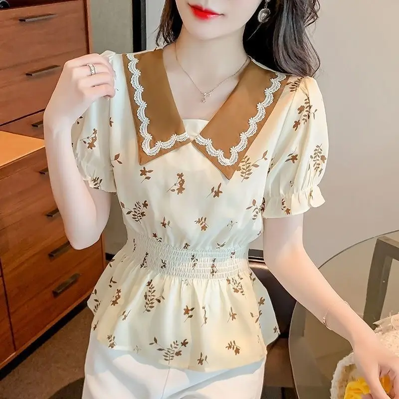 Women's Patchwork Lapel Chiffon Shirt Korean Fashion Floral Print Elastic Waist Tops Simple Versatile Short-Sleeve Shirts New
Women's Patchwork Lapel Chiffon Shirt Korean Fashion Floral Print Elastic Waist Tops Simple Versatile Short-Sleeve Shirts New