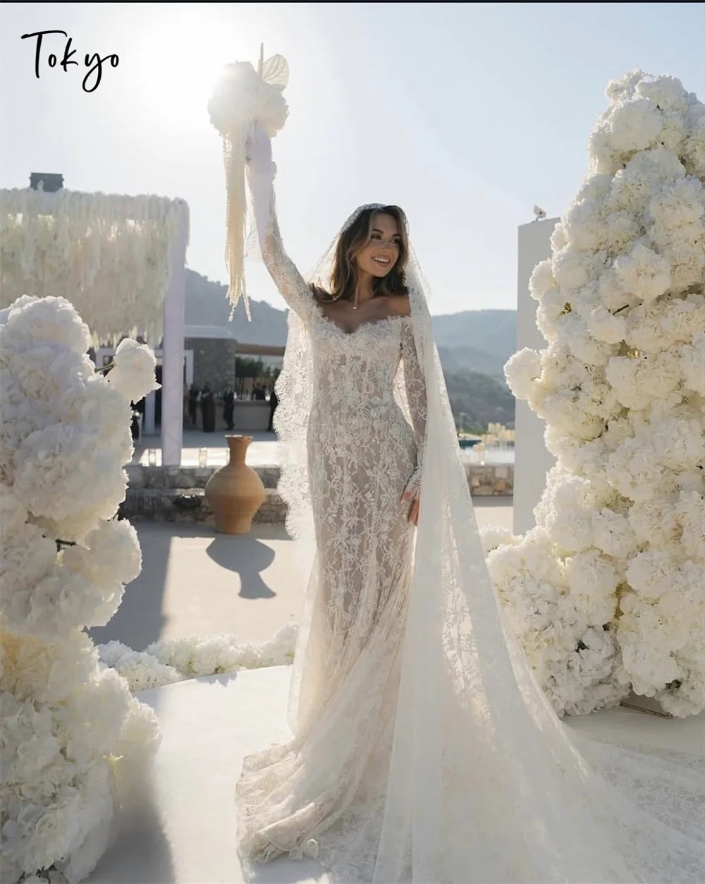 Элегантные свадебные платья с открытыми плечами по индивидуальному заказу Токио, кружевные свадебные платья со шлейфом и длинными рукавами, белые свадебные платья русалки
Элегантные свадебные платья с открытыми плечами по индивидуальному заказу Токио, кружевные свадебные платья со шлейфом и длинными рукавами, белые свадебные платья русалки