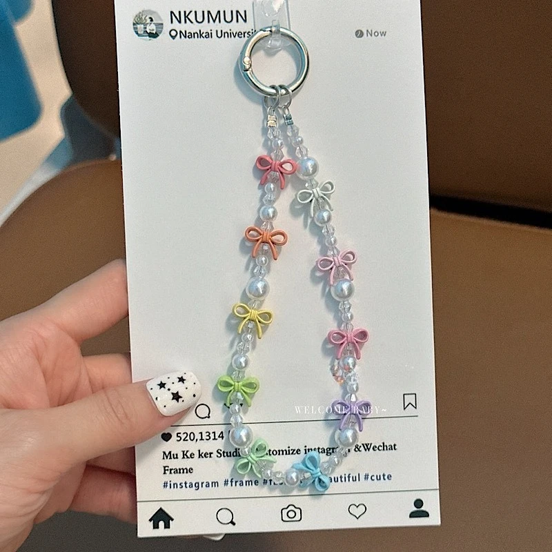 New Colorful Bow Pearl Phone Lanyard Bag Car Key Pendant Airpods Headphone Hanging Jewelry Star Love Pendant Mobile Phone Chain
New Colorful Bow Pearl Phone Lanyard Bag Car Key Pendant Airpods Headphone Hanging Jewelry Star Love Pendant Mobile Phone Chain