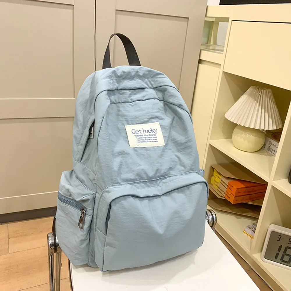 Simple Lightweight Travel Backpack Korean Style Waterproof Solid Color Backpack Nylon Large Capacity Student Schoolbag Outdoor
Simple Lightweight Travel Backpack Korean Style Waterproof Solid Color Backpack Nylon Large Capacity Student Schoolbag Outdoor