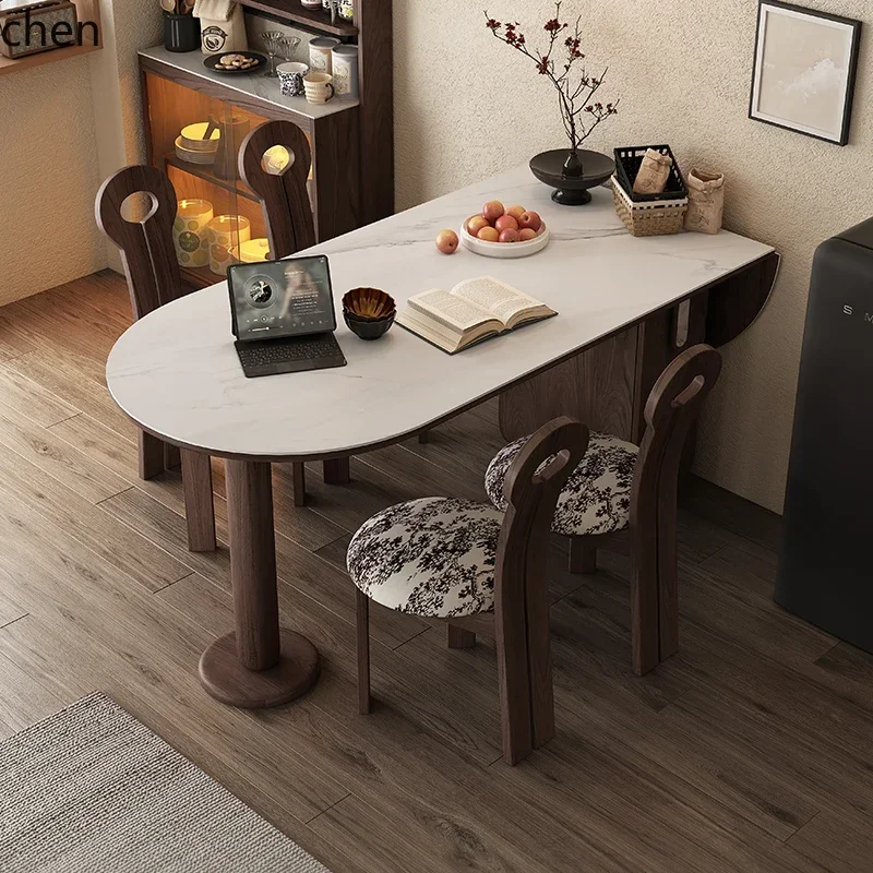 Foldable dining table and chair combination household slate dining table solid wood oval dining table
Foldable dining table and chair combination household slate dining table solid wood oval dining table