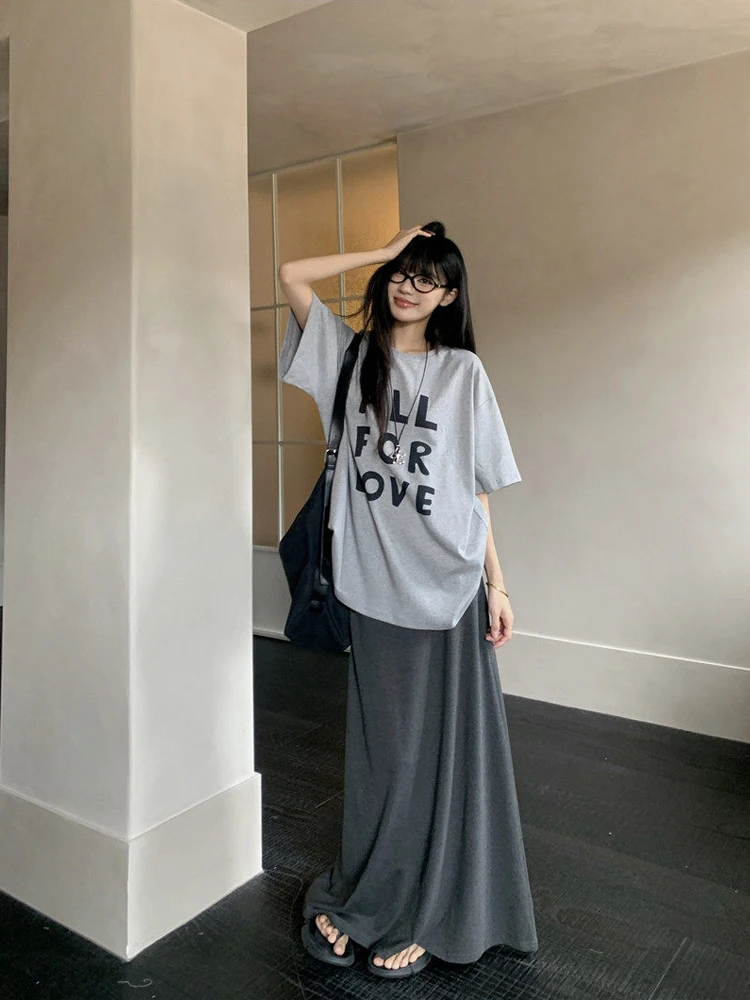 Spring 2026 Women's Loose Fit Grey Letter Print Short Sleeve T-Shirt And Midi Skirt Two Piece Set Casual Fashion Outfit
Spring 2026 Women's Loose Fit Grey Letter Print Short Sleeve T-Shirt And Midi Skirt Two Piece Set Casual Fashion Outfit