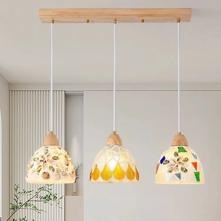 Medieval shell glass three-headed small chandelier Nordic restaurant bar bedside lamp atmosphere entrance tea room chandelier
Medieval shell glass three-headed small chandelier Nordic restaurant bar bedside lamp atmosphere entrance tea room chandelier