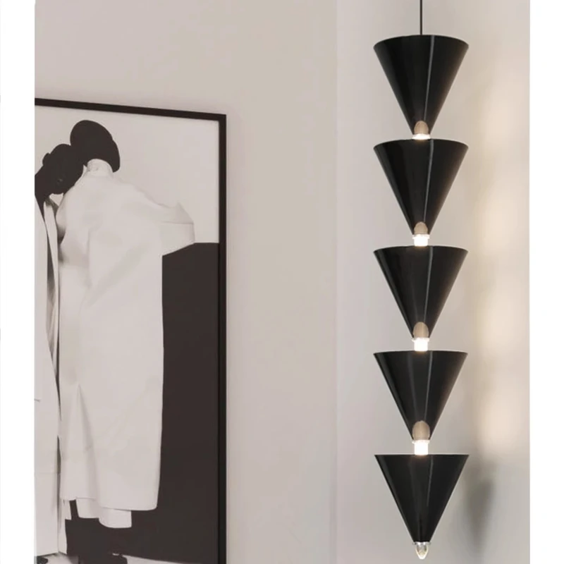 Cream wind bedroom bedside chandelier modern simple creative living room background wall cone long line chandelier
Cream wind bedroom bedside chandelier modern simple creative living room background wall cone long line chandelier