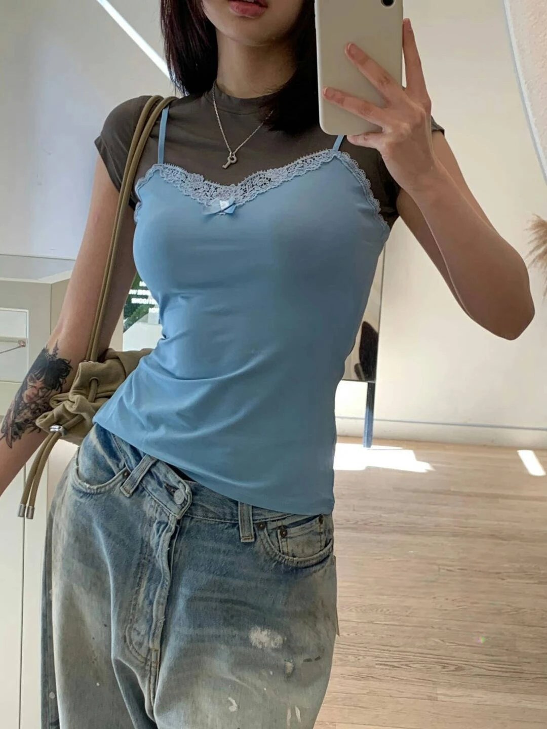 Contrast color lace bow halter fake two short sleeve T-shirt women 2025 summer new Spice slim-fit top
Contrast color lace bow halter fake two short sleeve T-shirt women 2025 summer new Spice slim-fit top