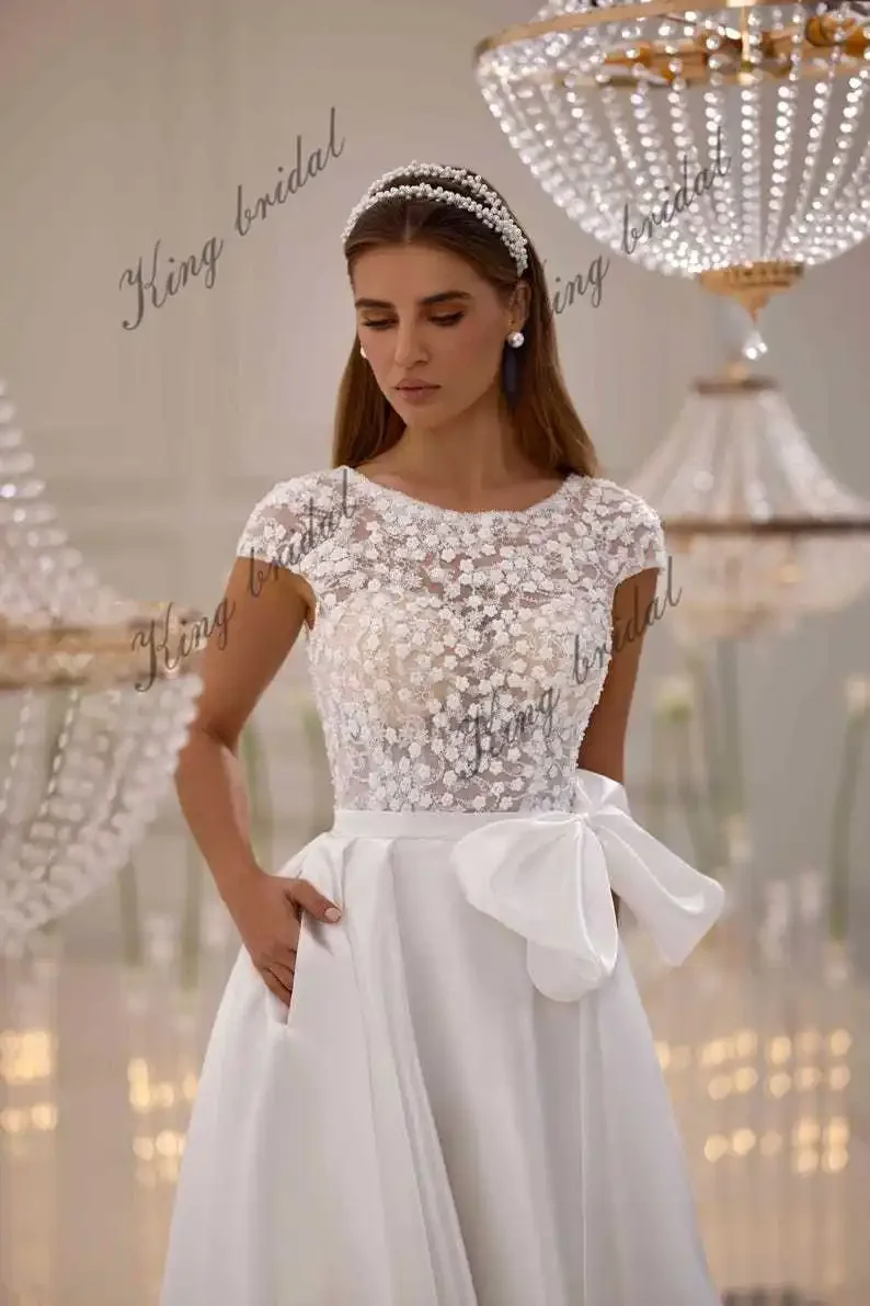 Simple Wedding Dress Floral Lace Wedding Dress Satin Skirt Corset Gown with Detachable Bow | A-Line Custom Bridal Gown
Simple Wedding Dress Floral Lace Wedding Dress Satin Skirt Corset Gown with Detachable Bow | A-Line Custom Bridal Gown
