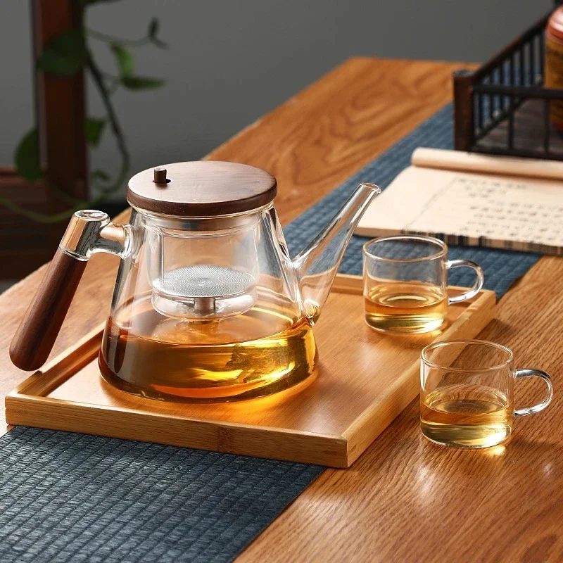 Easy One Click Tea Separation Filtration Glass Teapots With Wood Handle 850ml Tea Water Separation Tea Pot With Infuser Filter
Easy One Click Tea Separation Filtration Glass Teapots With Wood Handle 850ml Tea Water Separation Tea Pot With Infuser Filter