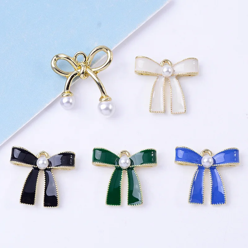 50pcs 18*21mm 20*23mm Gold color New fashion Alloy Material Pearl Enamel Bow charm for DIY Handmade Jewelry Making wholesale
50pcs 18*21mm 20*23mm Gold color New fashion Alloy Material Pearl Enamel Bow charm for DIY Handmade Jewelry Making wholesale