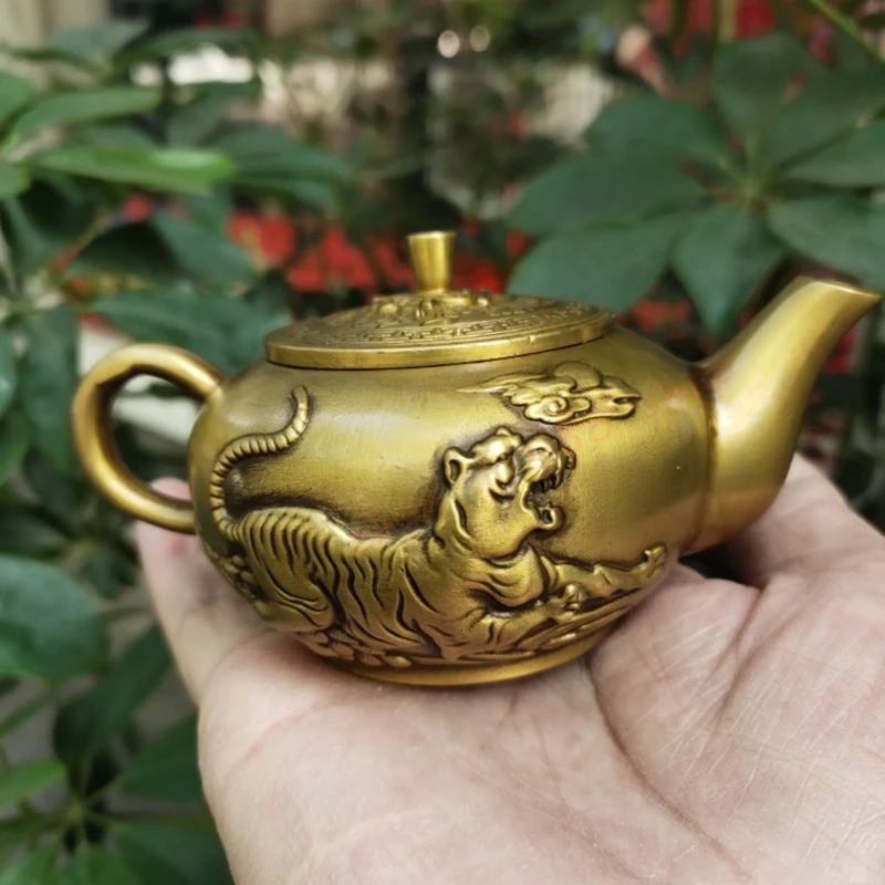 Brass Shangshan Tiger teapot, wine pot,Exquisite home crafts and ornaments,Auspicious decorations
Brass Shangshan Tiger teapot, wine pot,Exquisite home crafts and ornaments,Auspicious decorations