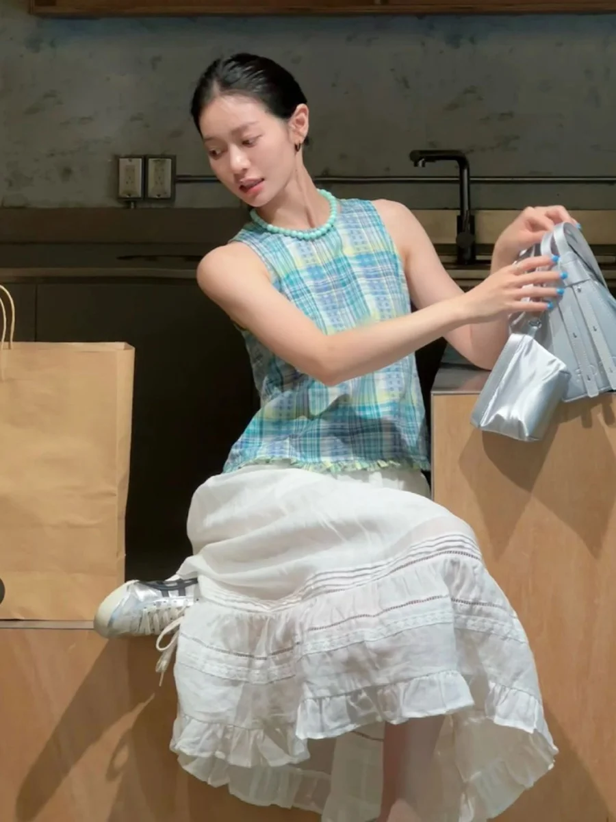 Dopne Refreing Agel Faion Plaid Svel irt Women Summer Korean Sweet Versatile Slimming Ruffle Vest
Dopne Refreing Agel Faion Plaid Svel irt Women Summer Korean Sweet Versatile Slimming Ruffle Vest