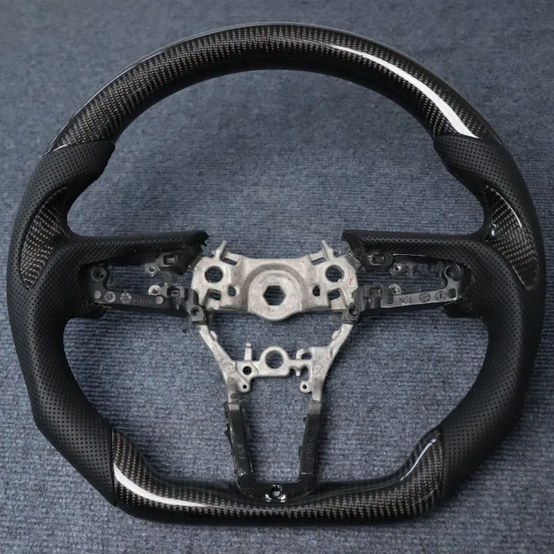 For Mazda CX-5/Axela Carbon Fiber Steering Wheel
For Mazda CX-5/Axela Carbon Fiber Steering Wheel