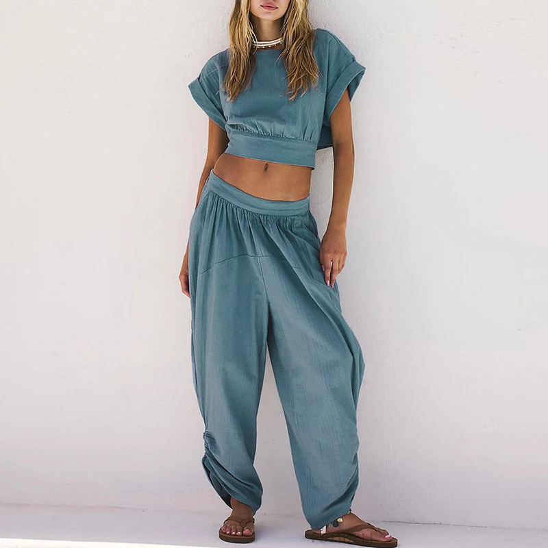 New 2025 Summer O Neck Short Sleeved Top + Wide Leg Pants Outfit Simple Solid Pocket Loose Suit Women Casual Holiday 2 Piece Set
New 2025 Summer O Neck Short Sleeved Top + Wide Leg Pants Outfit Simple Solid Pocket Loose Suit Women Casual Holiday 2 Piece Set