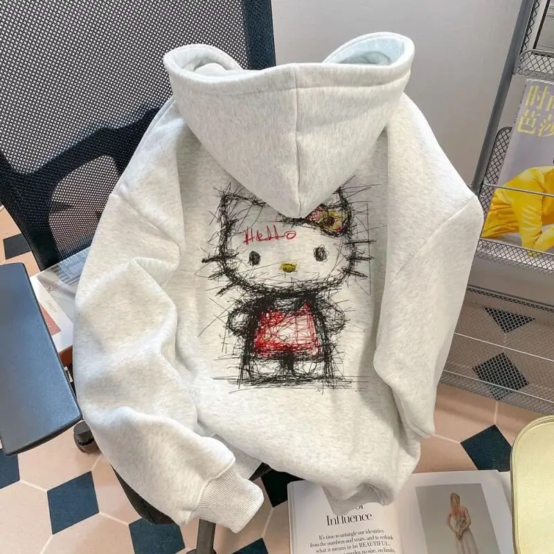 Толстовка с капюшоном «Hello Kitty» и граффити, осенне-зимняя женская одежда, модные топы для девочек, пальто, повседневная студенческая бархатная утепленная куртка
Толстовка с капюшоном «Hello Kitty» и граффити, осенне-зимняя женская одежда, модные топы для девочек, пальто, повседневная студенческая бархатная утепленная куртка