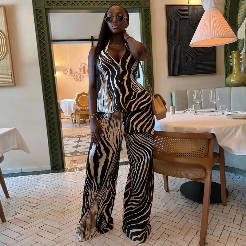 Elegant Women 2 Piece Set Zebra Printed Halter Neck Sleeveless Vest Wide Leg Pants Matching Set 2026 Summer Office Lady Outfit
Elegant Women 2 Piece Set Zebra Printed Halter Neck Sleeveless Vest Wide Leg Pants Matching Set 2026 Summer Office Lady Outfit