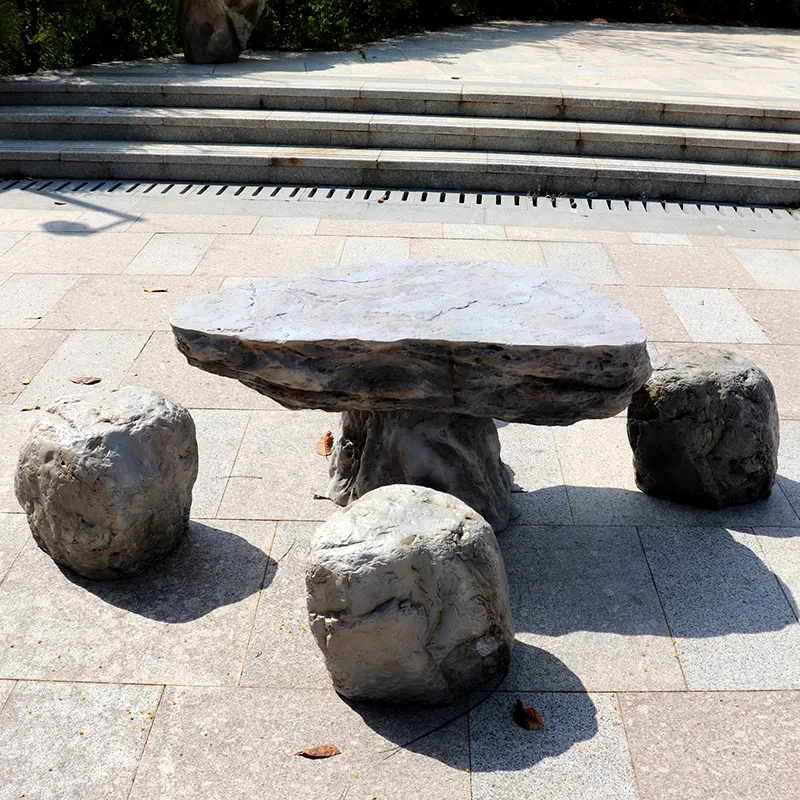 Simulation stone table stone stool courtyard a set of fiberglass sculpture fake stone garden landscape park landscaping
Simulation stone table stone stool courtyard a set of fiberglass sculpture fake stone garden landscape park landscaping