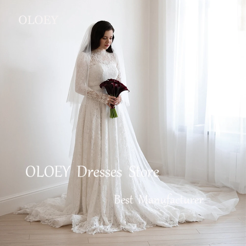 OLOEY Modest Ivory Lace A Line Wedding Dress High Neck Full Sleeves Bridal Gown Floor Length Button Back Sweep Train Custom Made
OLOEY Modest Ivory Lace A Line Wedding Dress High Neck Full Sleeves Bridal Gown Floor Length Button Back Sweep Train Custom Made