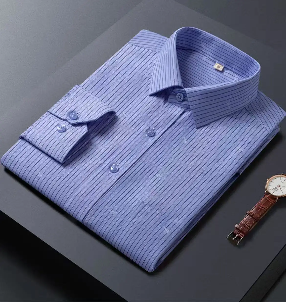 Высококачественная мужская рубашка с длинным рукавом в вертикальную полоску с карманом на лацкане, классическая против морщин, деловая повседневная офисная мужская одежда, топ
Высококачественная мужская рубашка с длинным рукавом в вертикальную полоску с карманом на лацкане, классическая против морщин, деловая повседневная офисная мужская одежда, топ