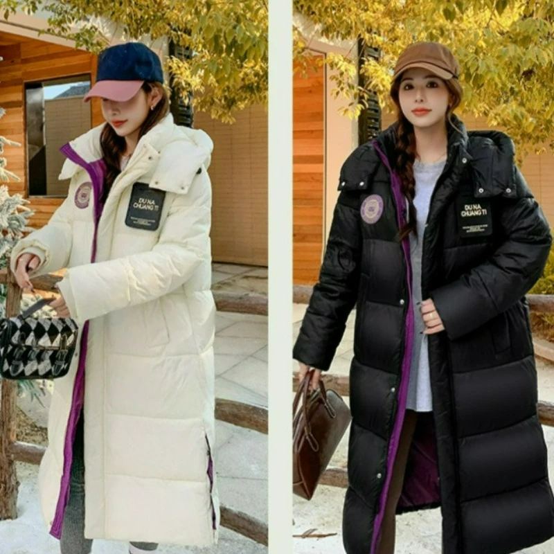 Женское пуховое пальто с хлопковой подкладкой, длинное черное пальто с капюшоном на хлопковой подкладке, зима 2026, новый стиль, высококачественная теплая верхняя одежда до колена
Женское пуховое пальто с хлопковой подкладкой, длинное черное пальто с капюшоном на хлопковой подкладке, зима 2026, новый стиль, высококачественная теплая верхняя одежда до колена