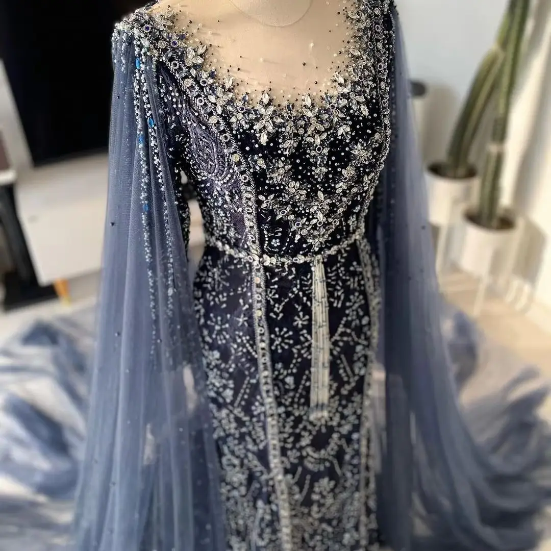 FATAPAESE Customized Beaded Crystals Gems Wedding Gown with Tulle Cape Long Sleeve Sheer-neck Mermaid Sheath Slim Gown Maxi Skir
FATAPAESE Customized Beaded Crystals Gems Wedding Gown with Tulle Cape Long Sleeve Sheer-neck Mermaid Sheath Slim Gown Maxi Skir