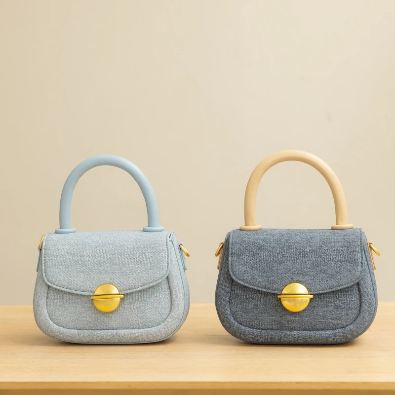 2024 Summer Fashion Blue Denim Fabric Top-Handle Handbag High Quality Women's Small Commuter Crossbody Tote Female New Arrivals
2024 Summer Fashion Blue Denim Fabric Top-Handle Handbag High Quality Women's Small Commuter Crossbody Tote Female New Arrivals