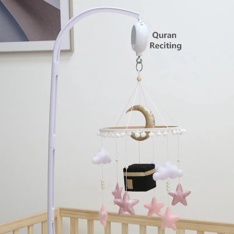 Crib, Kaaba, cell phone, baby cell phone, Koran recitation.
Crib, Kaaba, cell phone, baby cell phone, Koran recitation.